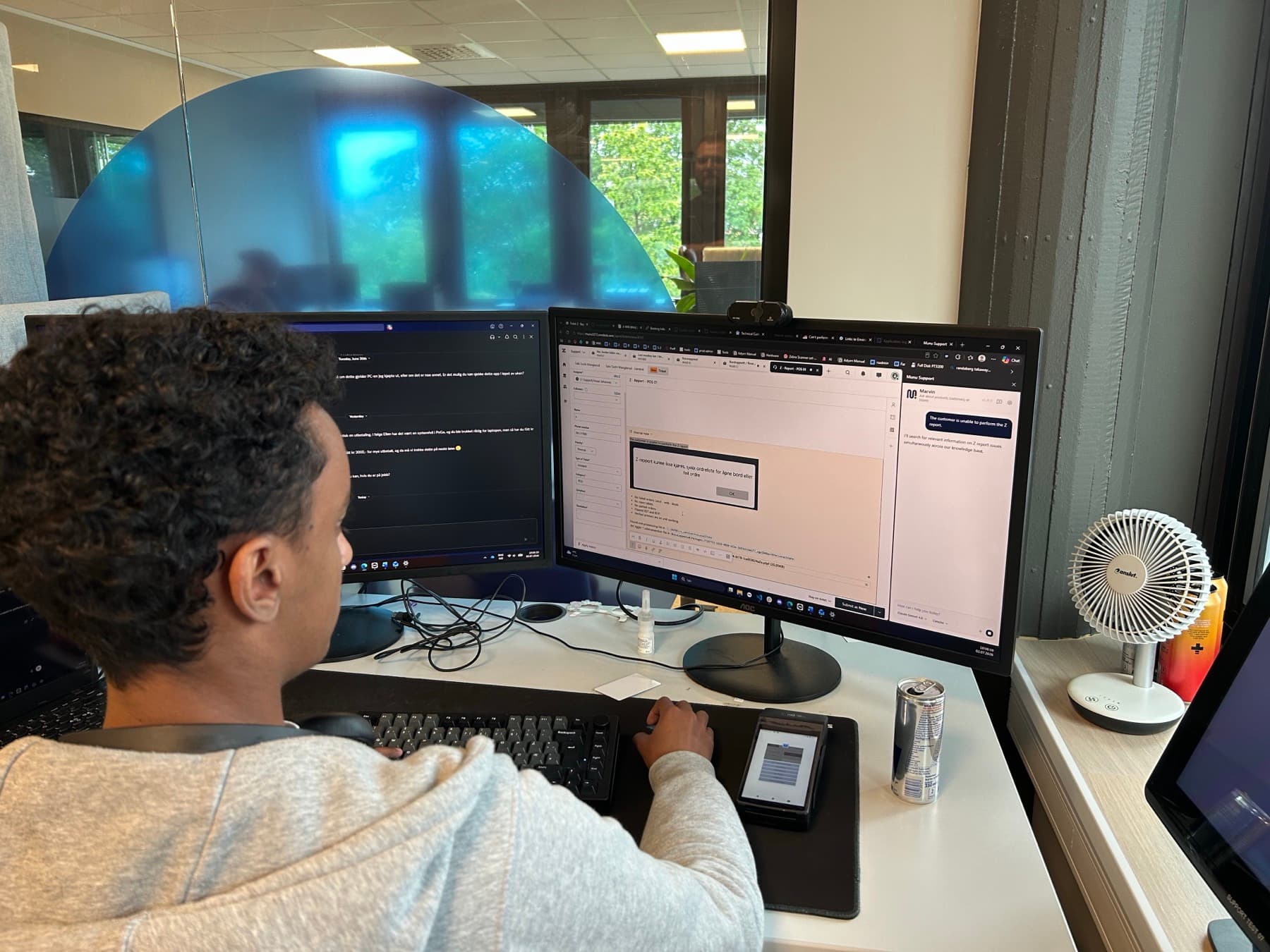Marvin, open beside a live ticket: the answer arrives where the work already happens.